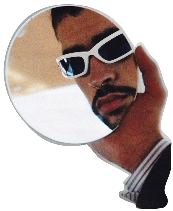 Bad Bunny looks in mirror wearing white sunglasses